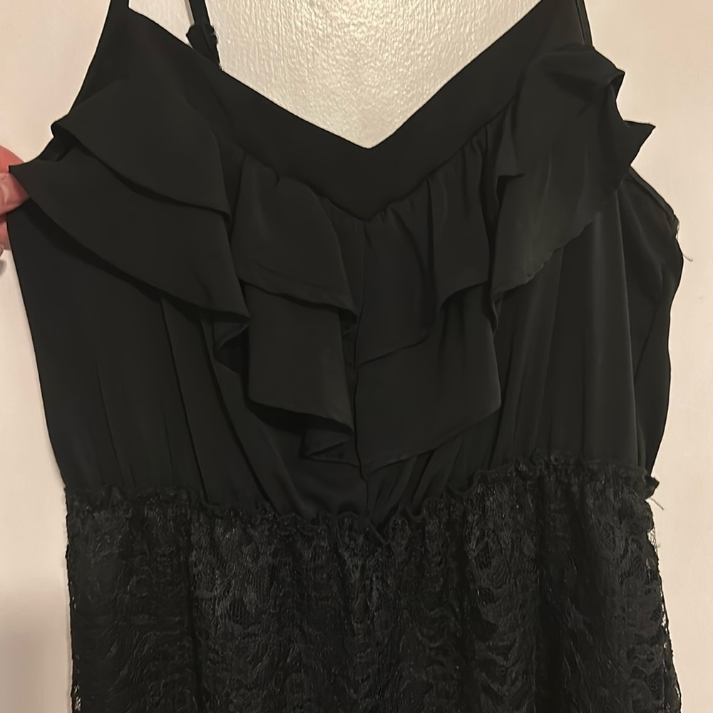Black dress with ruffle detail on top and lace on bottom